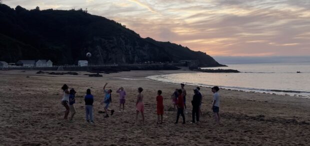 English Students enjoying beach volleyball in Jersey